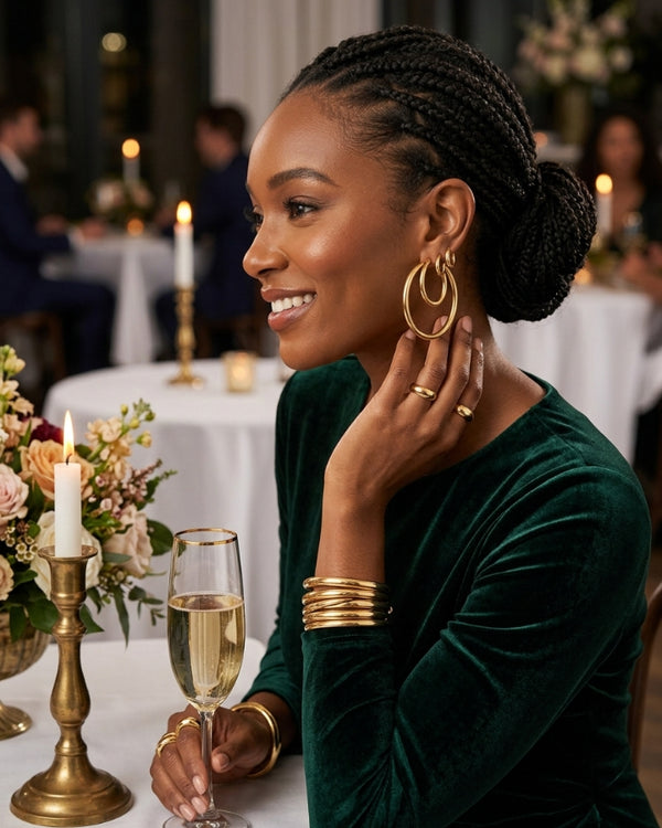 NOELLE B. wearing the Astra Tube Hoop Earrings
