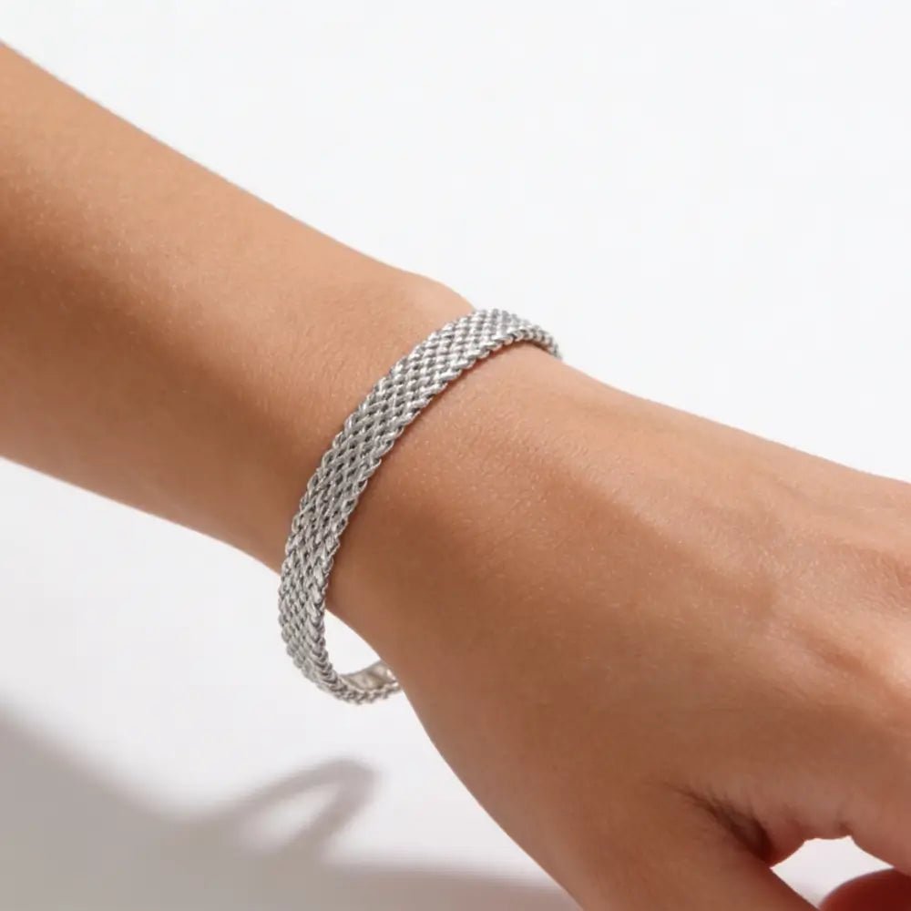 Seralya Bracelet Stack worn — layered gold bracelets for daily wear
