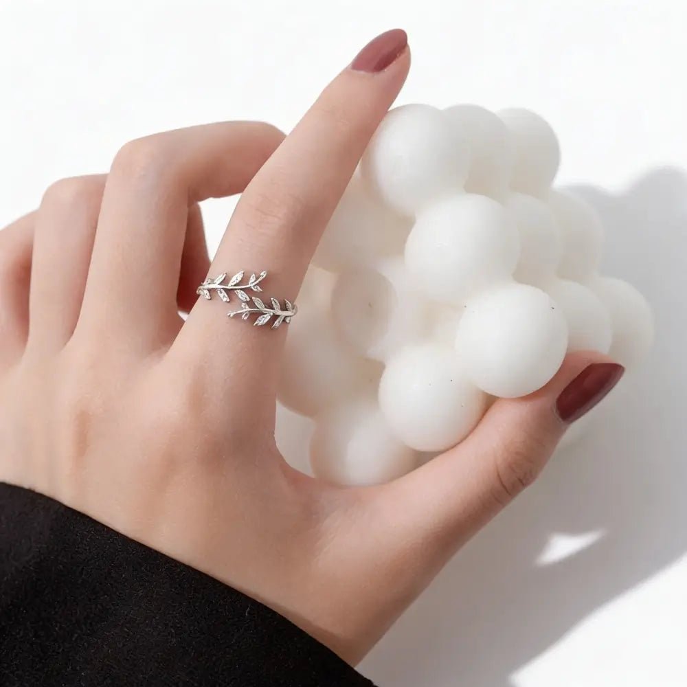 Elisia Leaf Ring worn on finger — dainty gold leaf ring, hypoallergenic